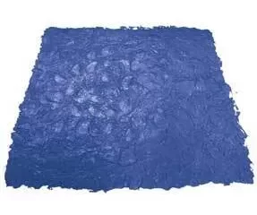A blue rug is sitting on top of a white surface