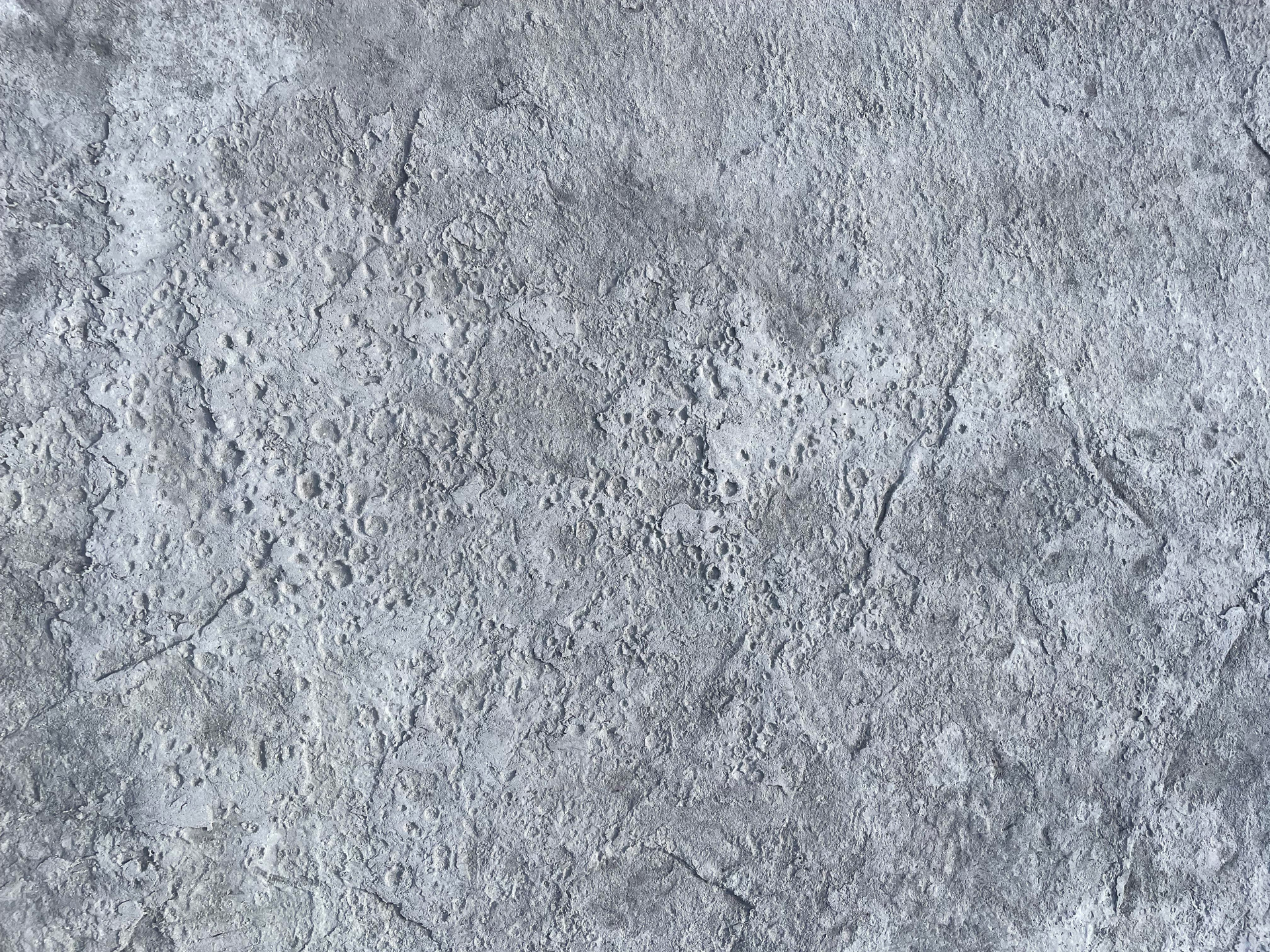 A close up of a gray stone wall texture