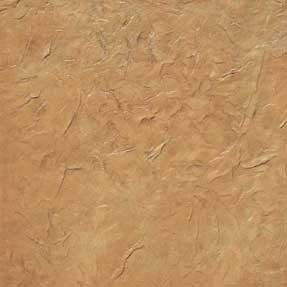 A close up of a piece of brown paper with a rough texture