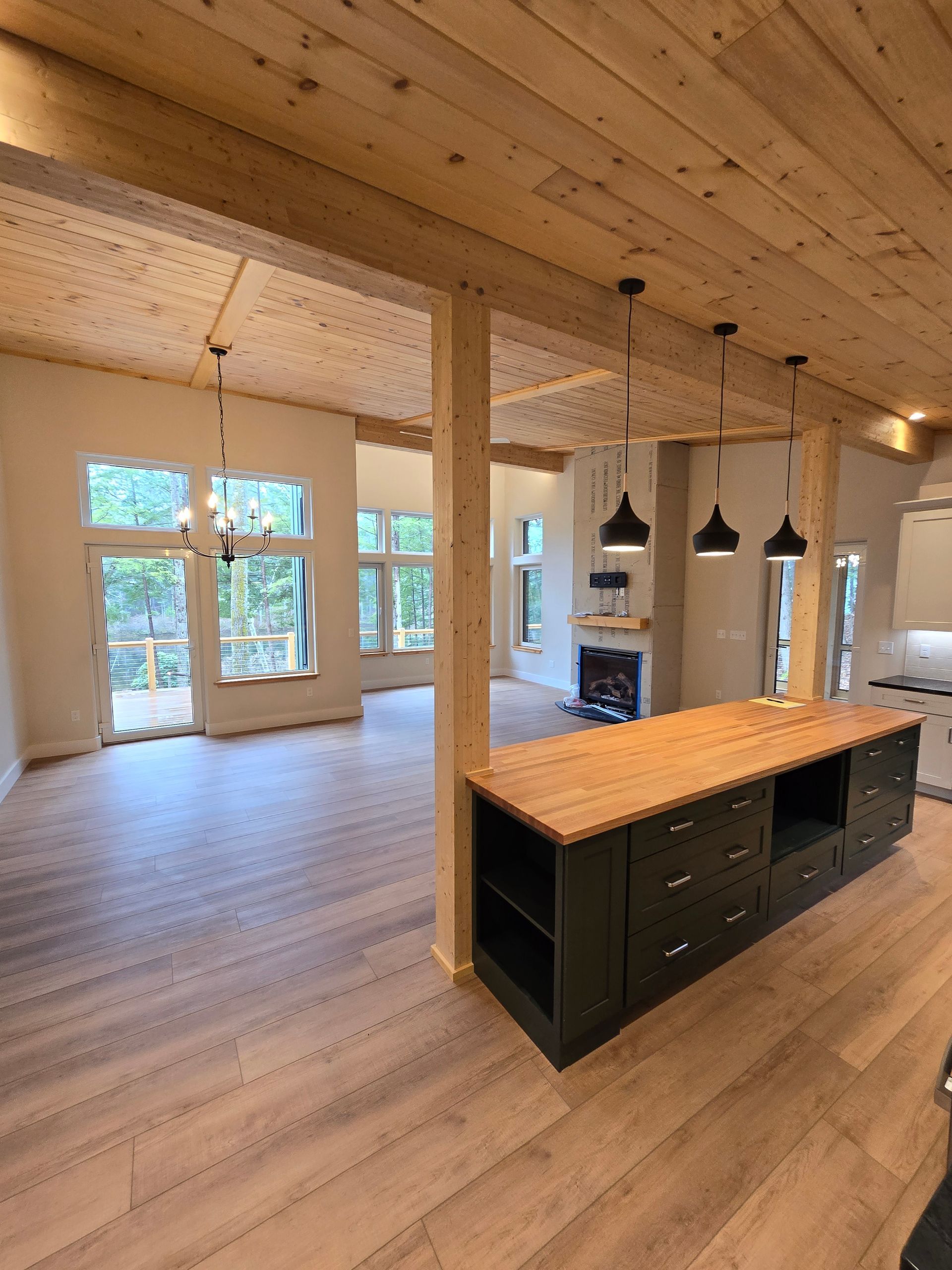 A kitchen with a large island in the middle of the room.
