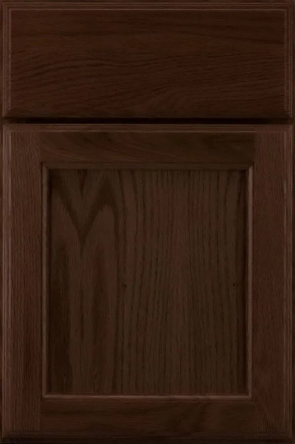 Dark brown wooden cabinet door with raised panel.