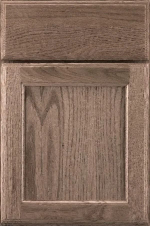 Wooden cabinet door with a raised panel, stained in a medium brown.