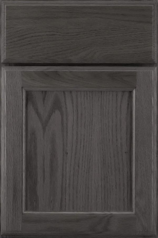 Dark gray wooden cabinet door with raised panel.