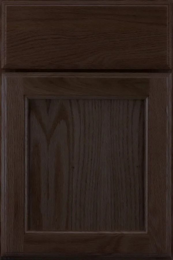 Dark brown wooden cabinet door with a raised panel.