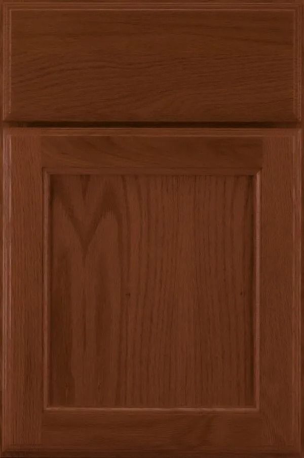 Brown wooden cabinet door with a raised panel.