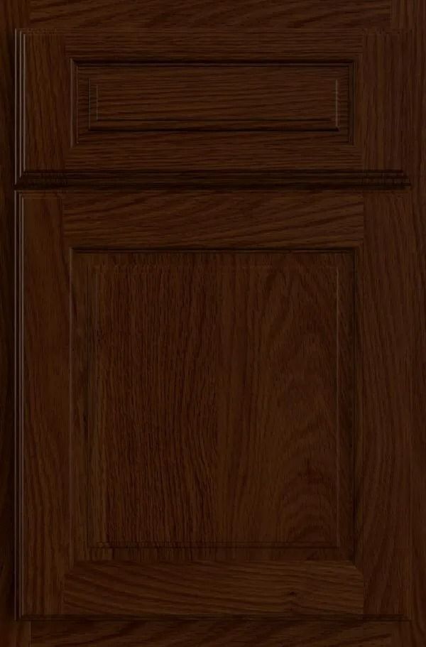 Dark brown, raised panel cabinet door with recessed upper panel.
