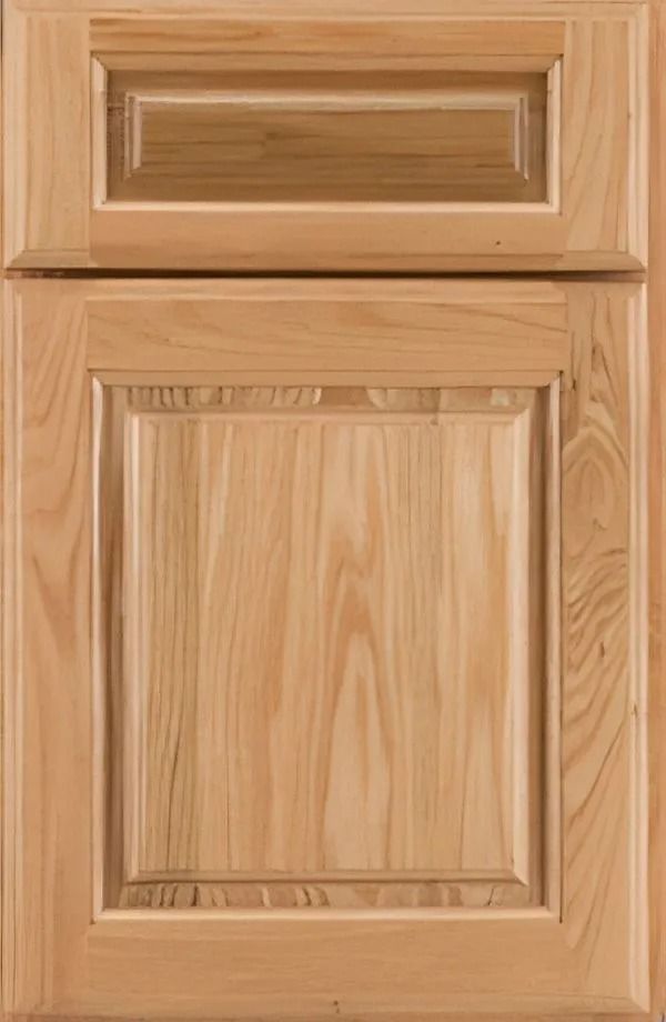 Light-colored wood cabinet door with a raised panel design, likely for a kitchen or bathroom.