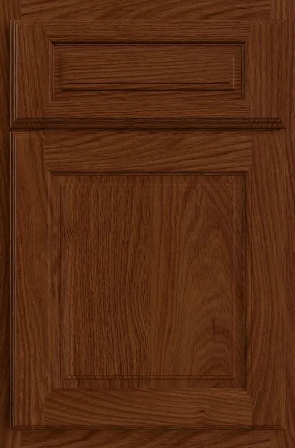 Brown wooden cabinet door with recessed panel and raised trim.