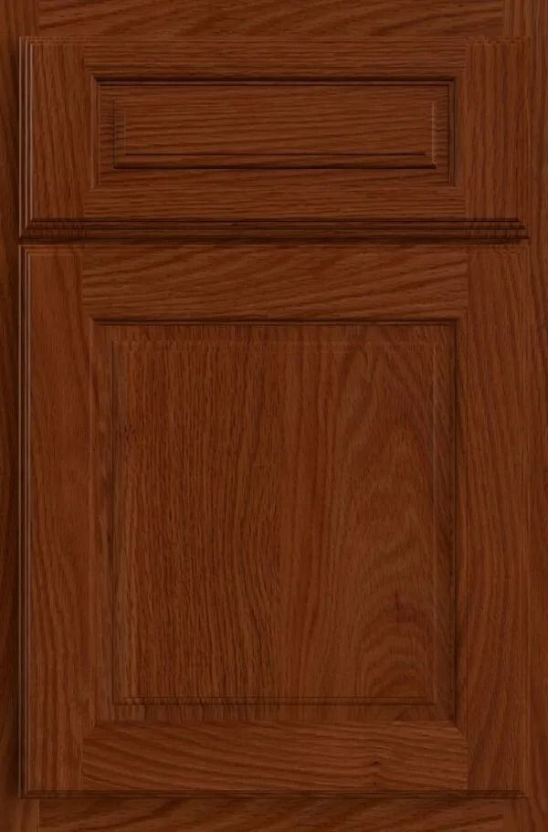 Wooden cabinet door with raised panel in a medium brown stain.