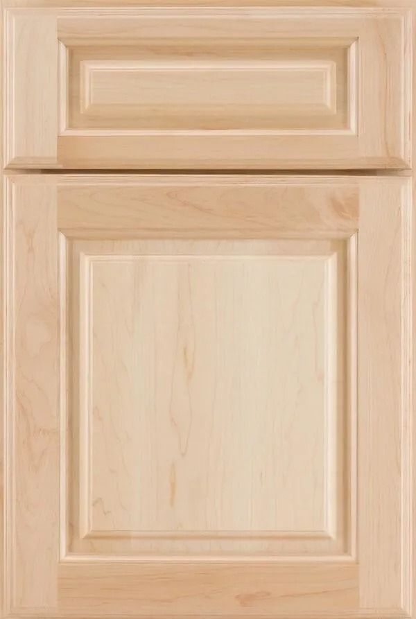 Light-colored wooden cabinet door with raised paneling and a smaller upper panel.