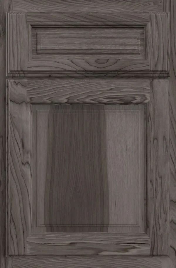 Gray wooden cabinet door with recessed panel and decorative molding.