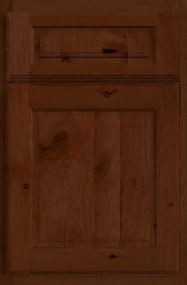 Dark brown wooden cabinet door with a raised panel.