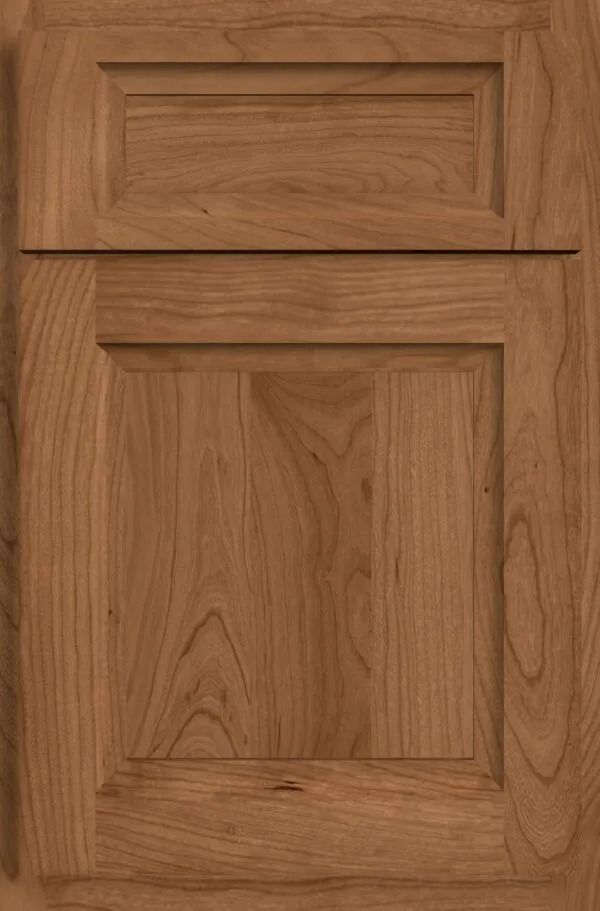 Wooden cabinet door with raised panel design, warm brown color, detailed wood grain.