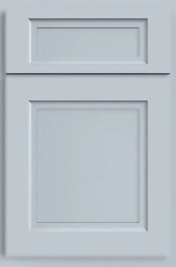 Light blue kitchen cabinet door with raised panel design.