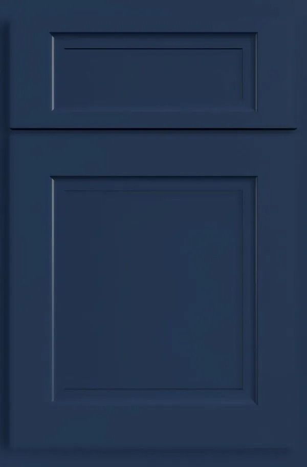 Navy blue kitchen cabinet door with a raised panel design.