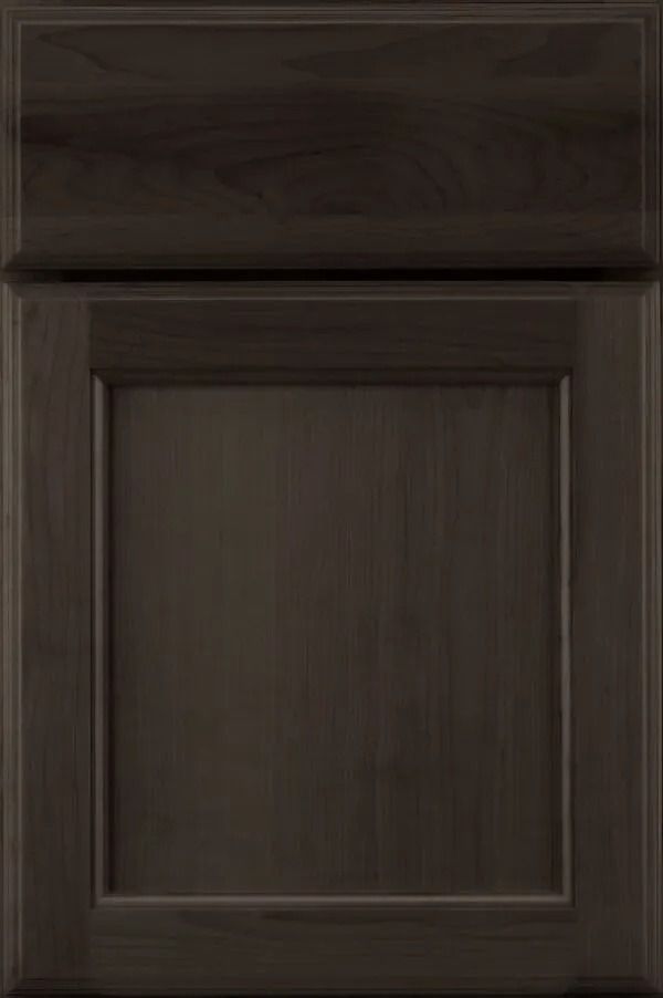 Dark brown raised-panel cabinet door.