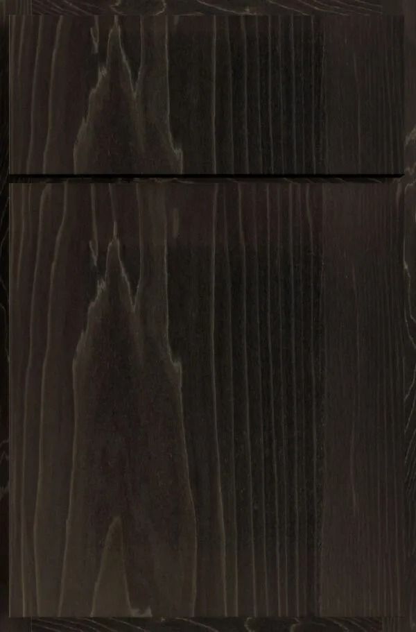 Dark stained wooden cabinet door, with prominent wood grain texture.
