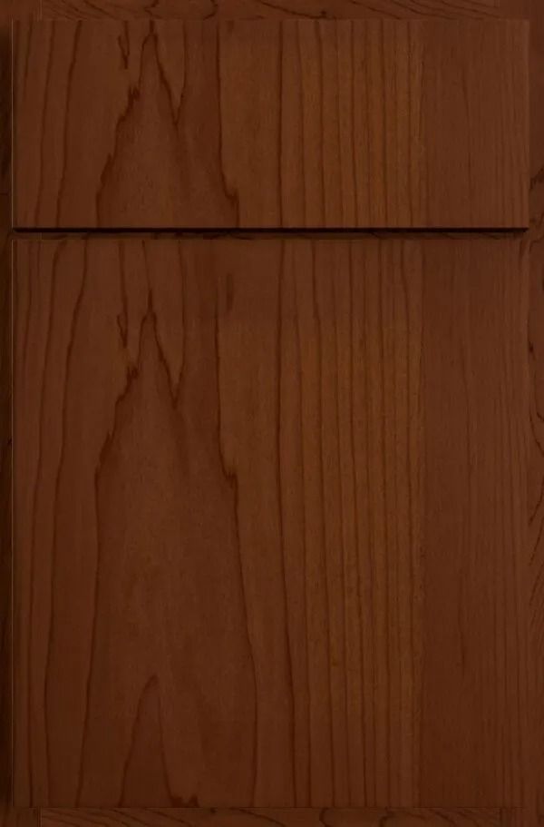 Wooden cabinet door with a medium-brown stain and visible wood grain.