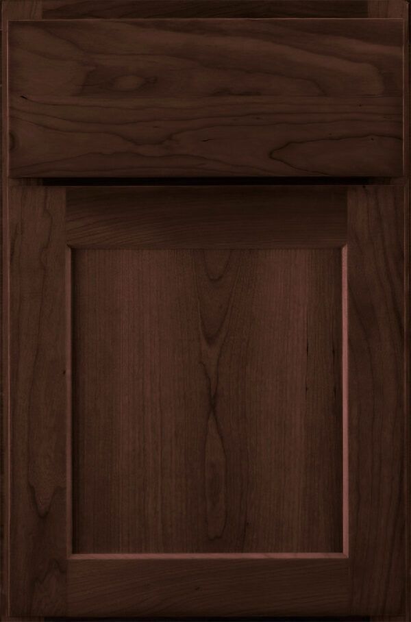 Dark brown wooden cabinet door with raised panel and top drawer.