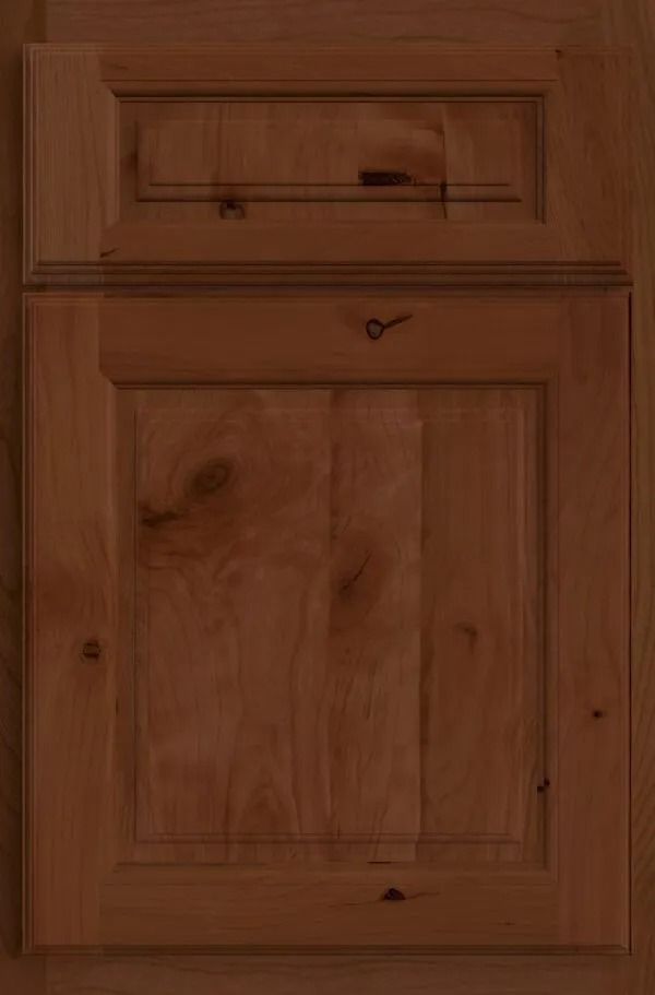 Wooden cabinet door with a raised panel design, stained a warm brown color.