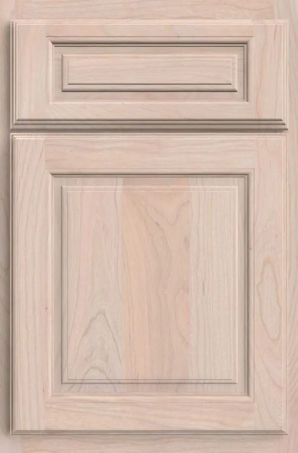 Light wood cabinet door with raised panel design.