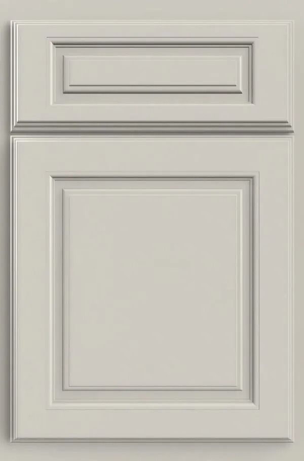 Off-white raised panel cabinet door with recessed upper panel and ornate trim.