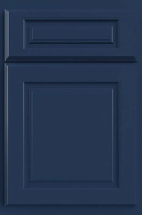 Navy blue kitchen cabinet door with raised panel details.