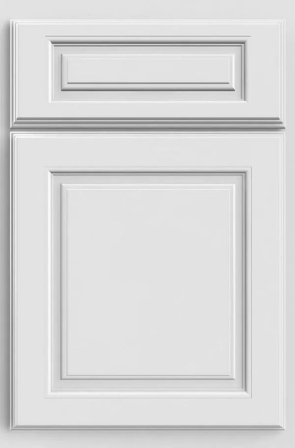 White raised panel cabinet door with decorative trim.