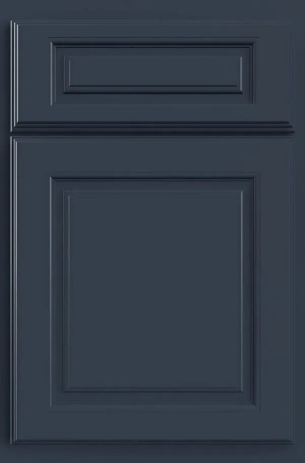 Navy blue kitchen cabinet door with raised panel detailing.