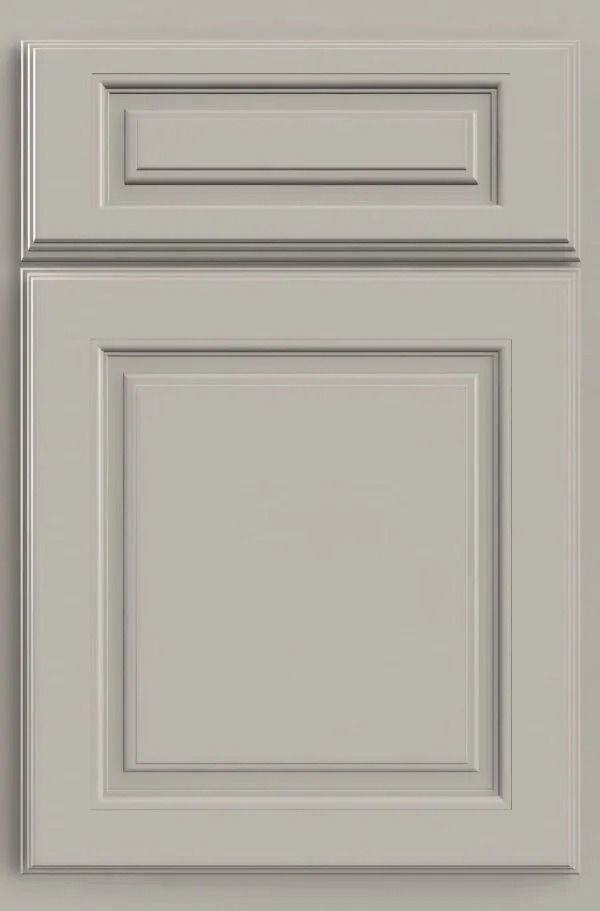 Gray raised panel cabinet door with molding details.