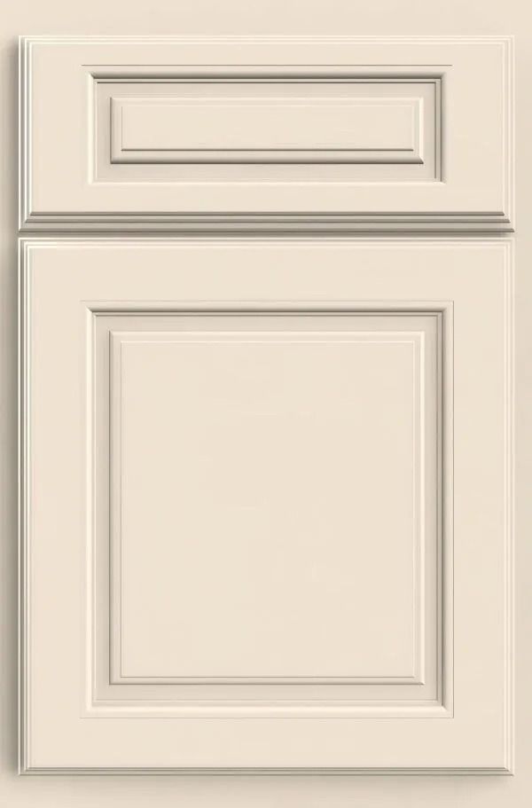 Cream-colored cabinet door with raised panel design, two-tone molding, and recessed rectangular top detail.