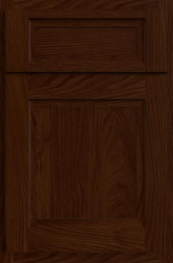 Dark brown wooden cabinet door with raised panels.