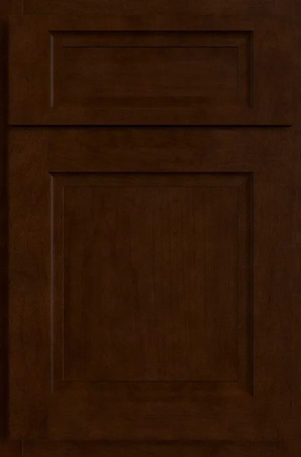 Dark brown wooden cabinet door with recessed paneling.