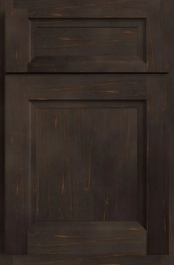 Dark stained wooden cabinet door with a raised panel design.
