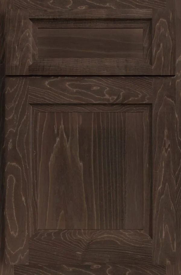Dark stained wooden cabinet door with a raised panel and visible wood grain.