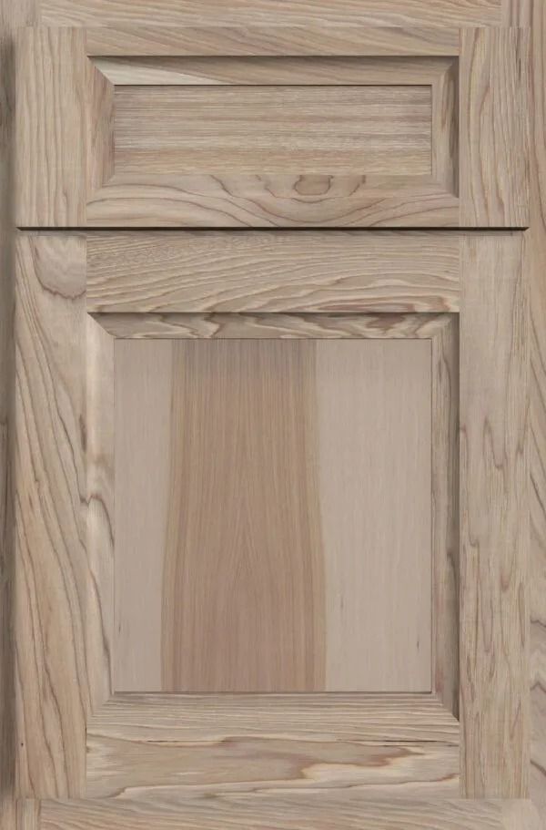 Light wood cabinet door with raised panel and rectangular upper section.