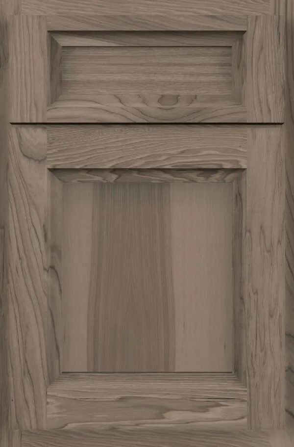 Wooden cabinet door with recessed panel, medium brown stain.