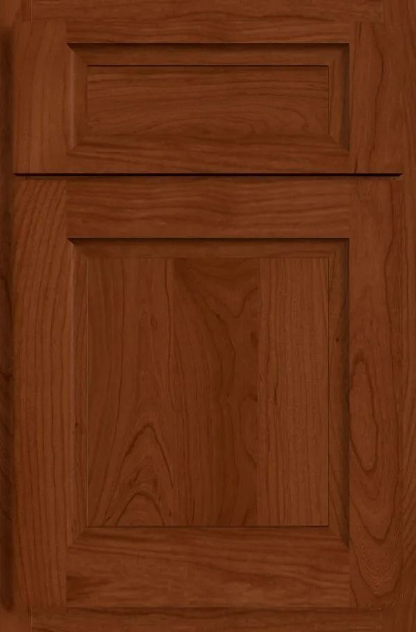 Brown cherry wood cabinet door with a raised panel.
