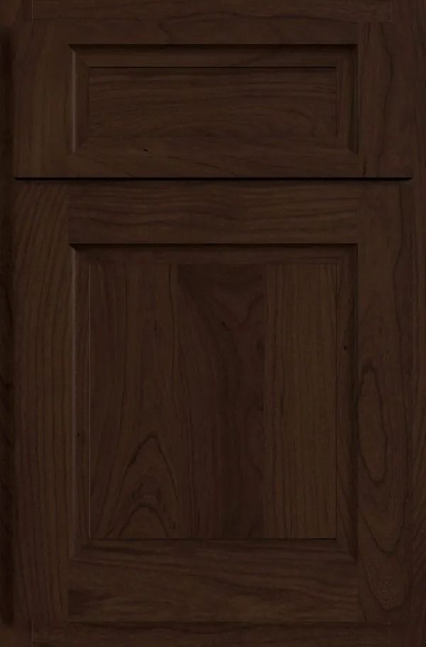 Dark brown wooden cabinet door with recessed panel.
