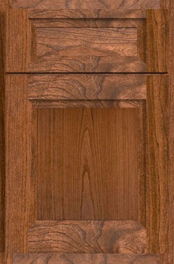 Wooden cabinet door with raised paneling, stained brown.
