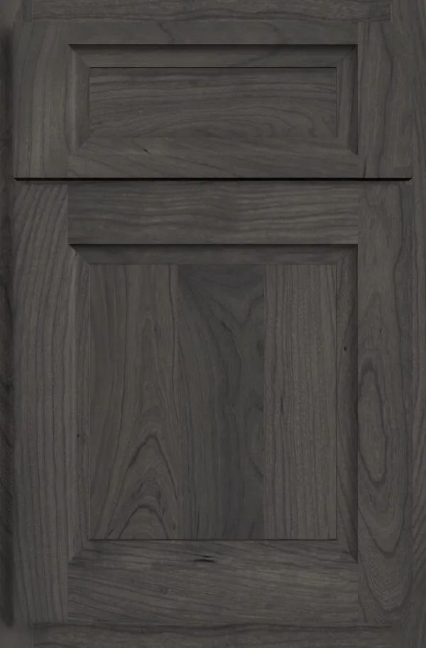 Dark gray kitchen cabinet door with raised panel design.