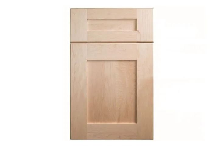 Unfinished light wood cabinet door with recessed panel.