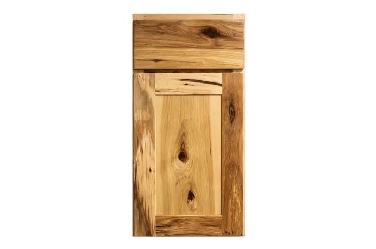 Wooden cabinet door with visible wood grain, warm tones.