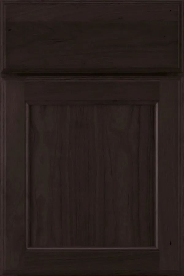 Dark brown cabinet door with recessed panel.