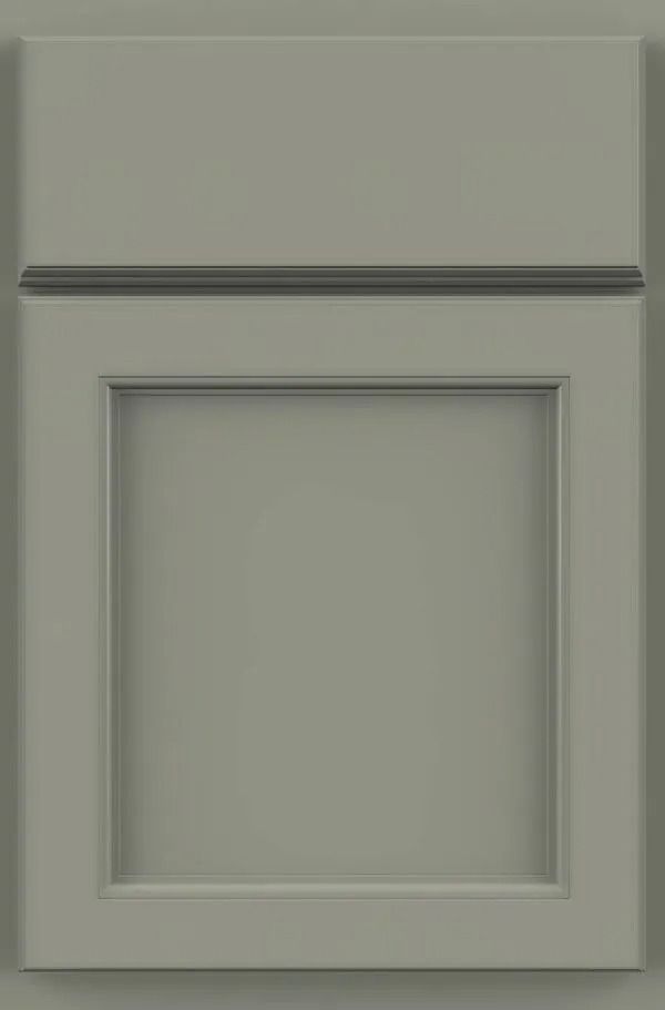 Gray cabinet door with recessed panel and decorative molding.
