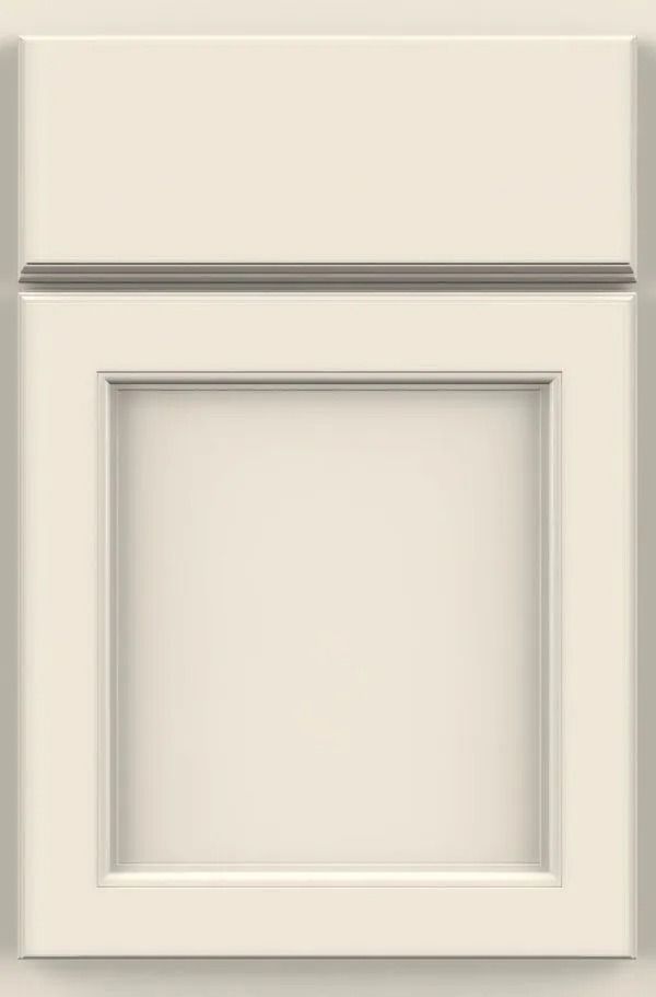 Cream-colored kitchen cabinet door with recessed panel and a decorative trim above.