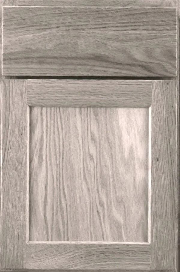Wooden cabinet door with a framed panel and top drawer.