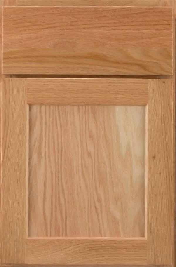 Light brown, wooden cabinet door with raised panel and wood grain detail.