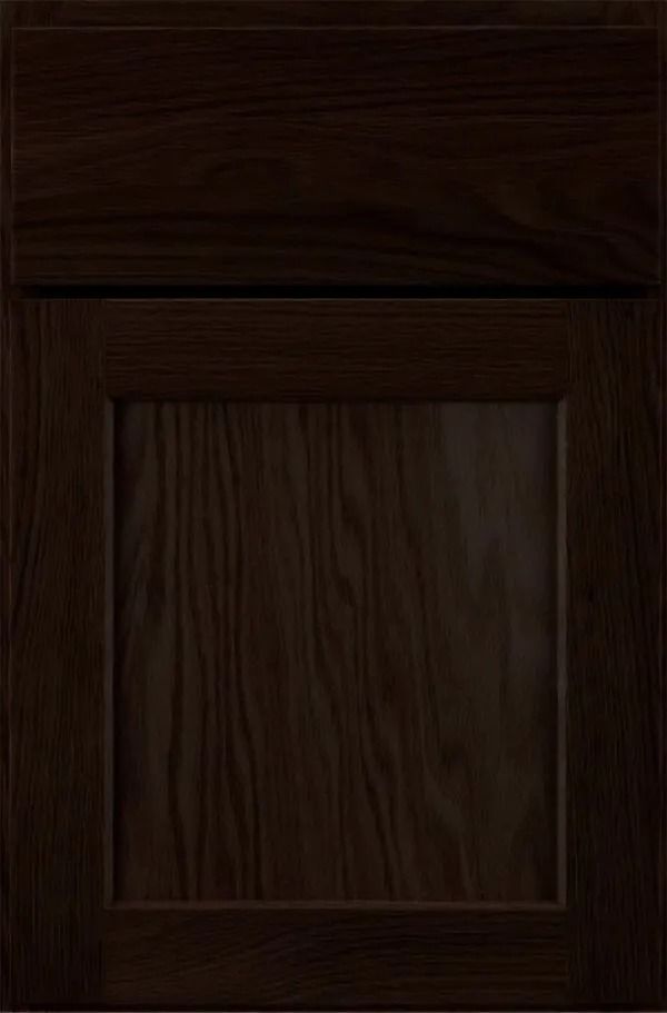 Dark brown wood cabinet door.