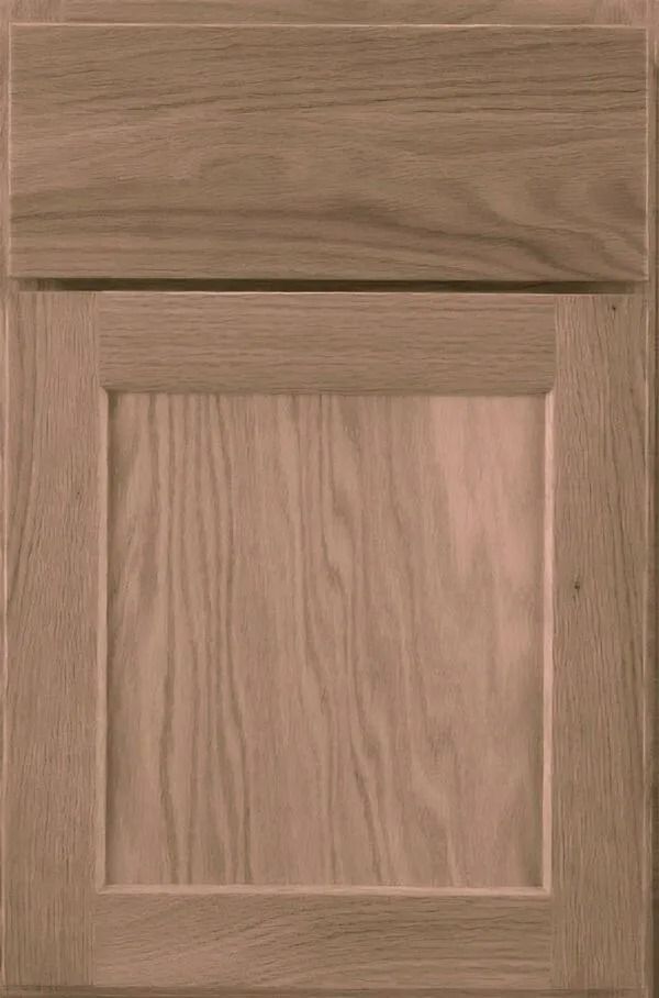Oak cabinet door with raised panel and upper cabinet door.